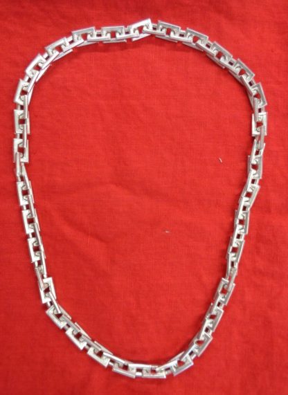 Heavy chain made into a necklace.