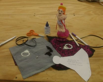 small purse kit under construction, with sewing tools
