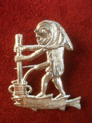 Ape with Pestle Brooch