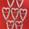 selection of heart shaped ring brooches with stones