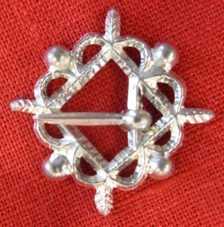 Openwork ring brooch