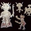 The devil brooches