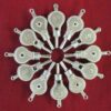 12 bellows whistles arranged in a ring