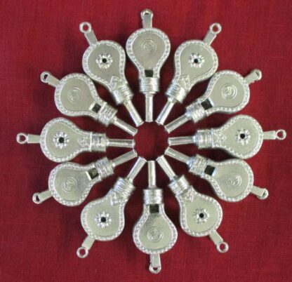 12 bellows whistles arranged in a ring