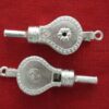 Bellows whistle, front and back