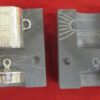 Mold for the toy cooking pot with a pair of castings in the two cavities