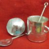 Toy pot with two of our toy spoons