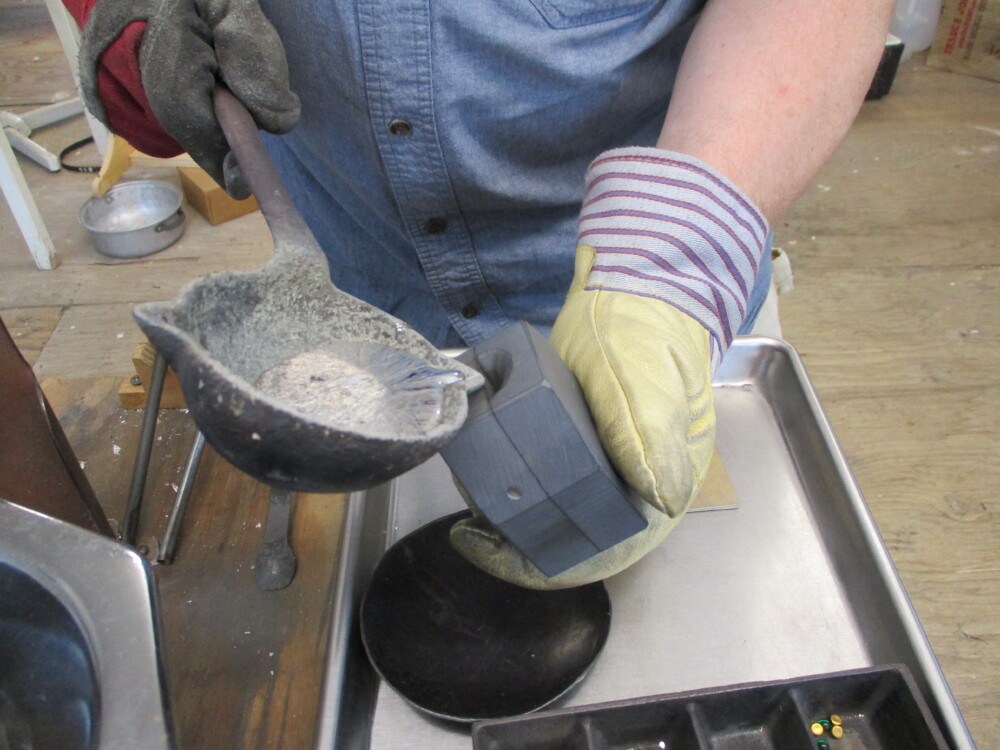 Holding the mold at an angle while pouring