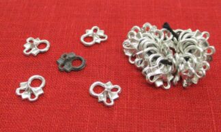 Pointy lacing eyelets - the original from our collection, some examples of our pointy eyelet individually, and a bundle of eyelets as sonld