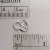 Filigree lacing eyelet with scale
