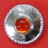 button with orange stone