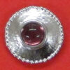 button with purple stone