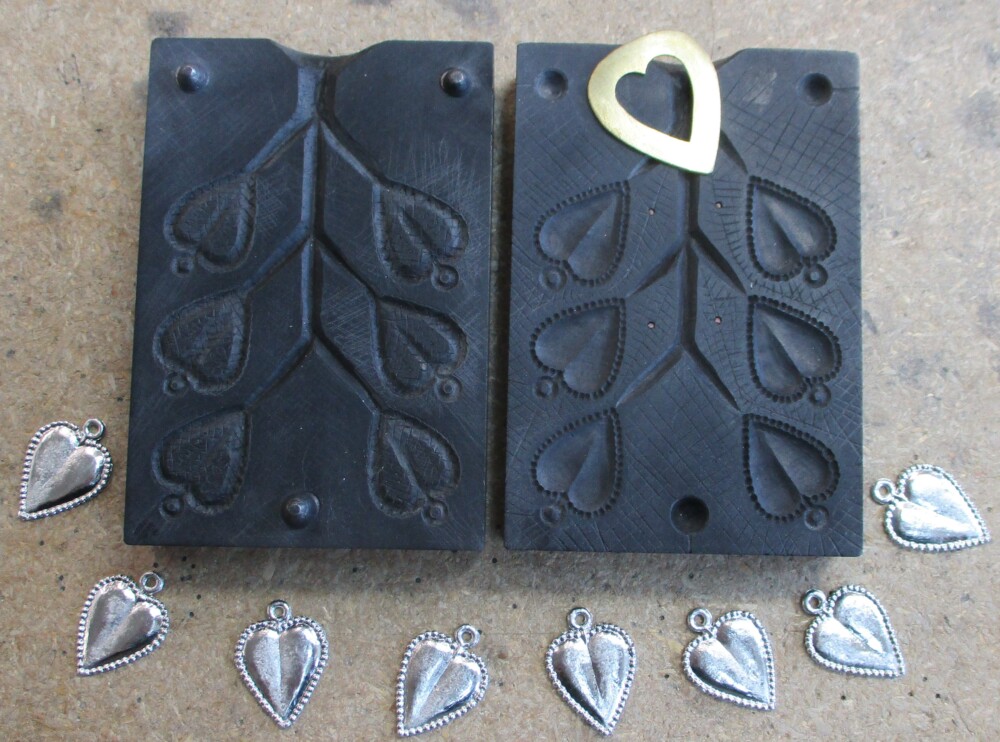 Mold for heart spangle with brass template and castings
