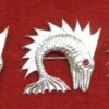 3 unpainted dolphin badges
