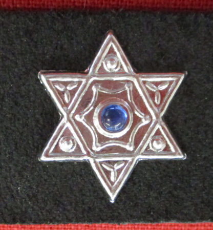 hexagram stud with blue stone