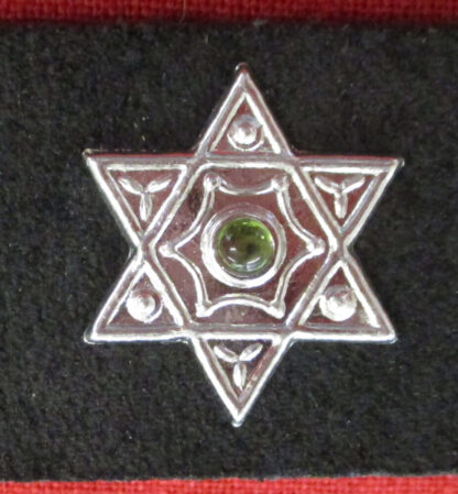 hexagram stud with light green stone