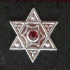 hexagram stud with red stone