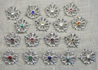 Fleur de Lis Starburst brooches, color selection