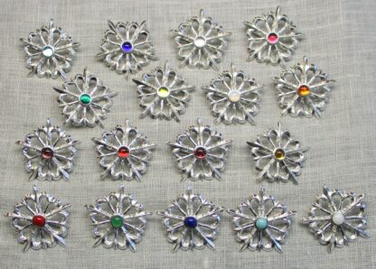 Fleur de Lis Starburst brooches, color selection
