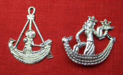 Two pewter objects with related iconography. The first shows a boat with the Virgin Mary with crown and halo holding the Christ child in one arm and steering the boat the a rudder with the other. The second shows a crowned woman in a boat holding a crowned penis in one hand and with the other hand on a penis that serves as a rudder.