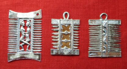 Three similar pendant combs with differing decoration in the middle between the teeth: the first with a scene of heterosexual intercourse; the second with an openwork decorative design; the third with a number of penises arranged along a ribbon