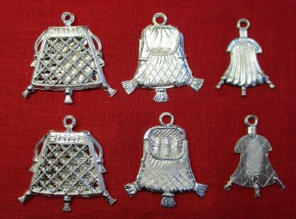 Front and back images of three similar pendant purses. The first is an openwork drawstring purse and contains a pretend coin. The second looks like a closed frame purse on one side; the other side reveals it contains three penises. The third is a small, closed frame purse.