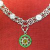 Necklace of alternating roses and links with stones, with a painted Laurel pendant