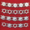 Collar links in the fomr of roses, laurel wreaths, and pelicans and a group of five joined links alternating wreaths and pelicans