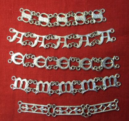 Sets of five links for the letters S, A, E, M. Also, the collar links in the shape of long openwork bars
