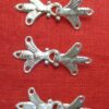 3 sets of bee hooks and eyes, hooked together