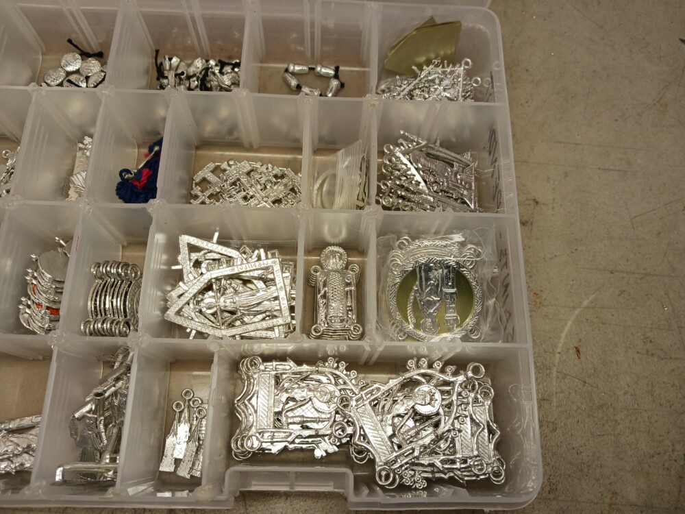 box of items in stock, some with backings