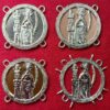 The pilgrim sign for St. Barbara, shown with pewter, copper, and brass sheet backings, and with no backing.