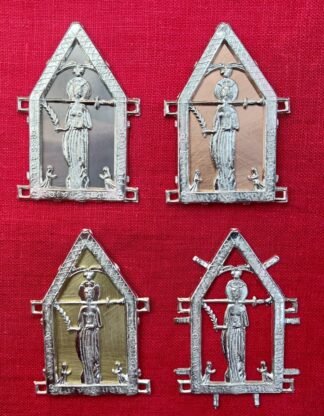 The pilgrim sign for St. Lucy, shown with pewter, copper, and brass sheet backings, and with no backing.